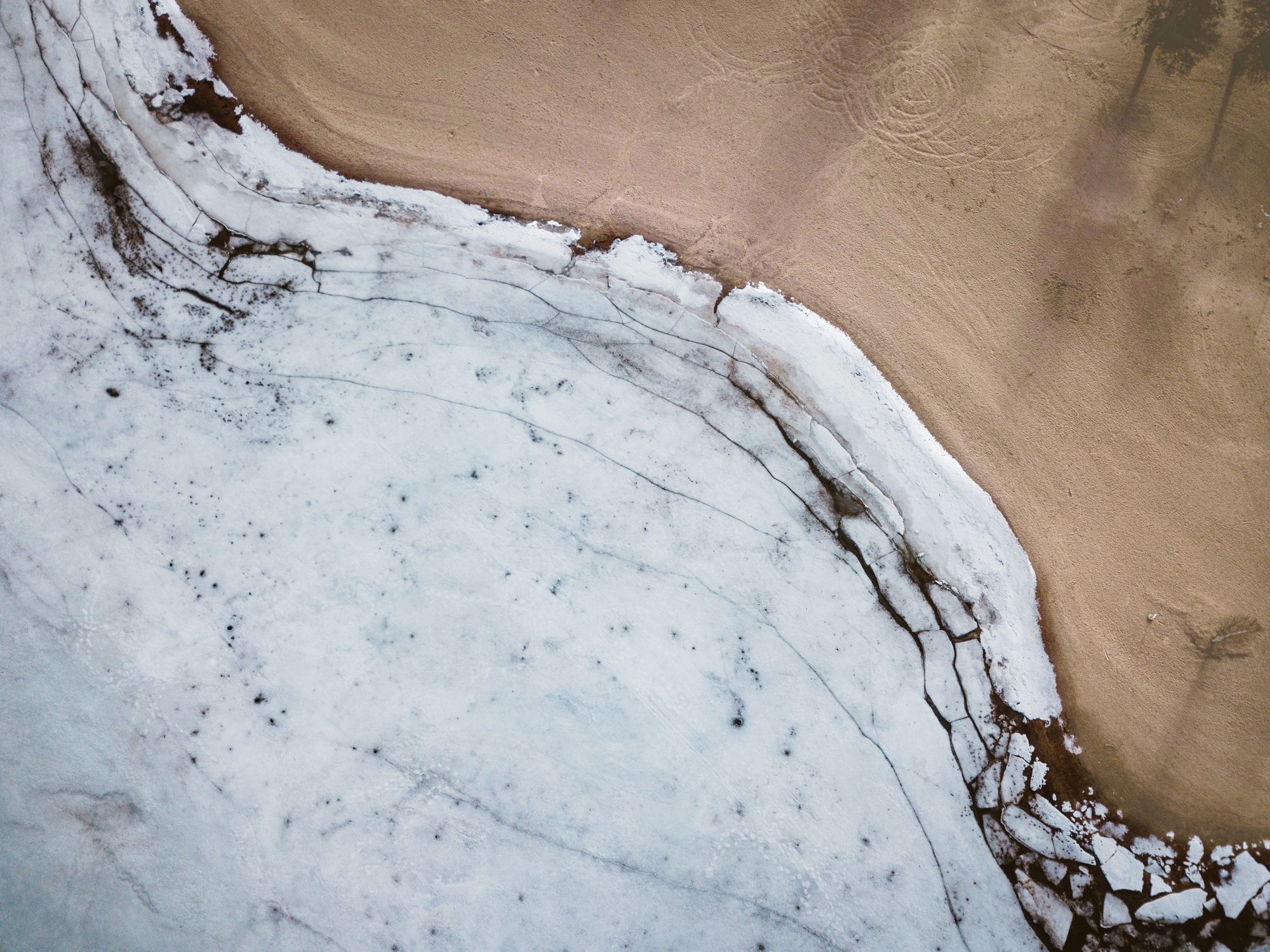 Aerial view of a sunlit coastline