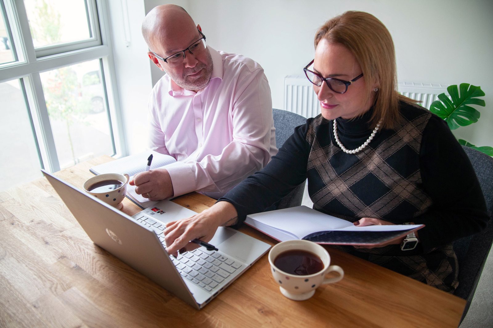 Team working together on a laptop